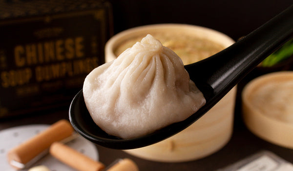 Cooked chinese soup dumpling in spoon