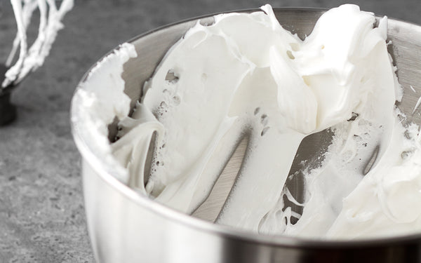 Italian meringue in metal bowl